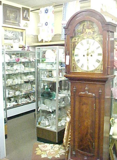 A booth of furniture and decorative pieces in the antique mall